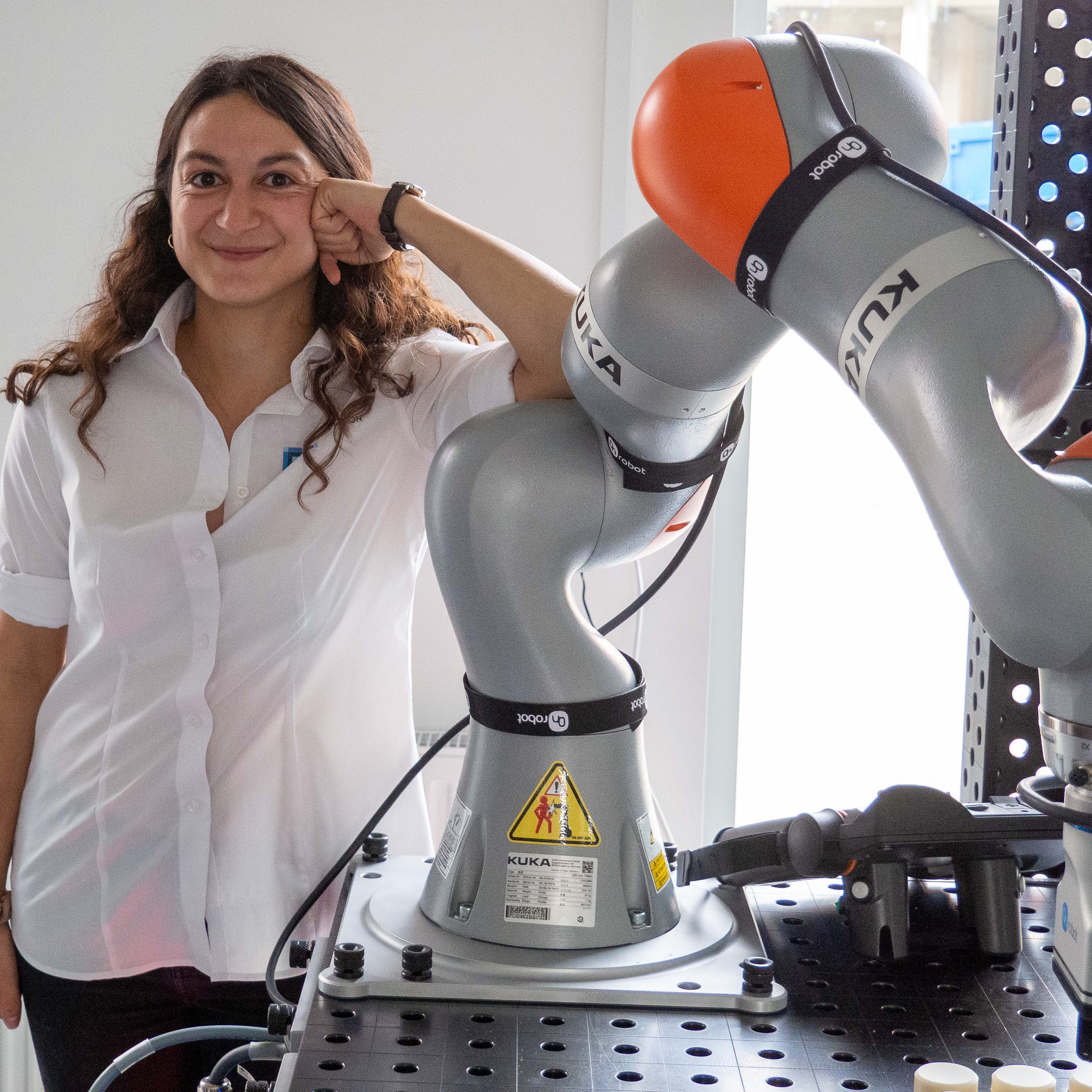 Daniella Tola with KUKA robot